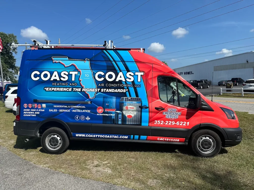 A Coast to Coast service van is parked outside, proudly showcasing the team's branding, contact info, and HVAC equipment graphics.